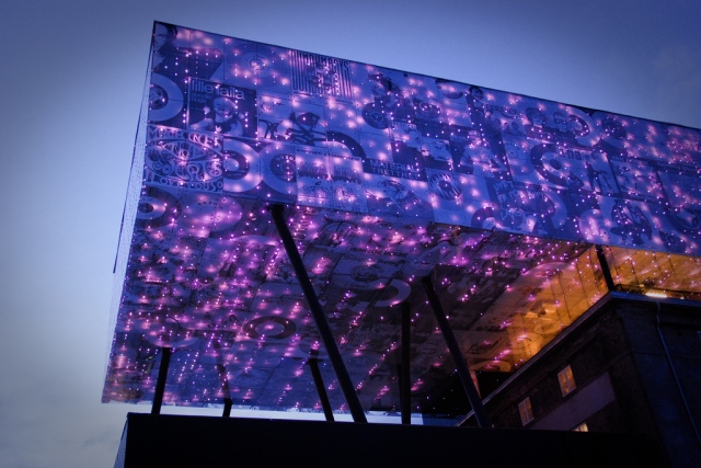 The Rockheim Museum in norway has a large illuminated feature which uses digital glass printing to great effect.